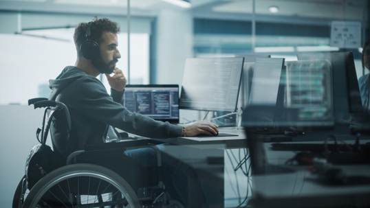 person with disability working at an office