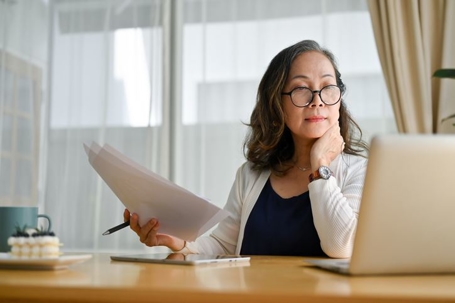 woman reading computer