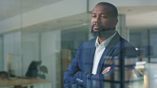 Federal employee looking out of window