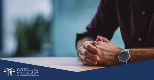 employee holding his hands