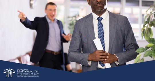 employee shouting at another employee who is Black