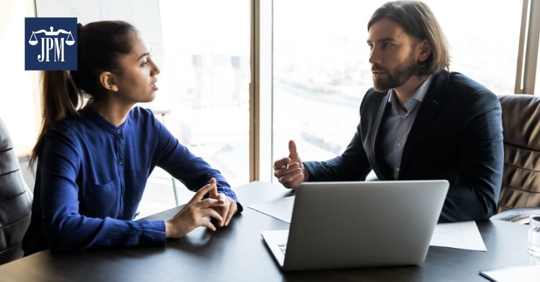 employees talking about performance improvement plans